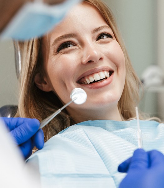 A woman receiving a dental checkup in Los Angeles