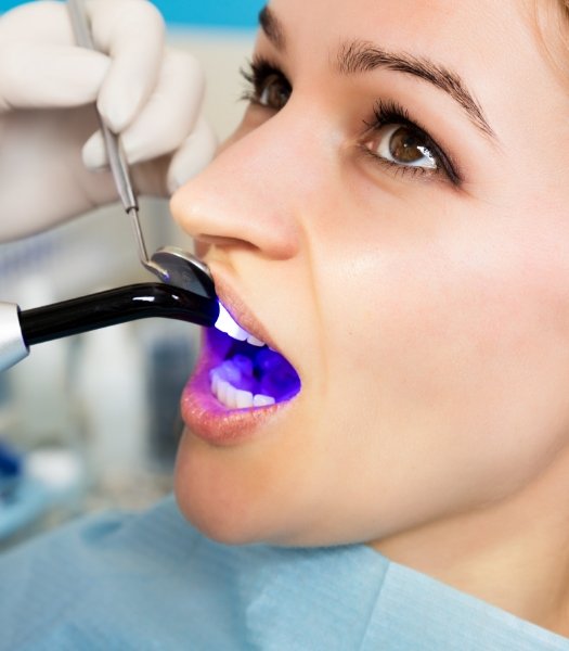 Patient receiving cosmetic dental bonding