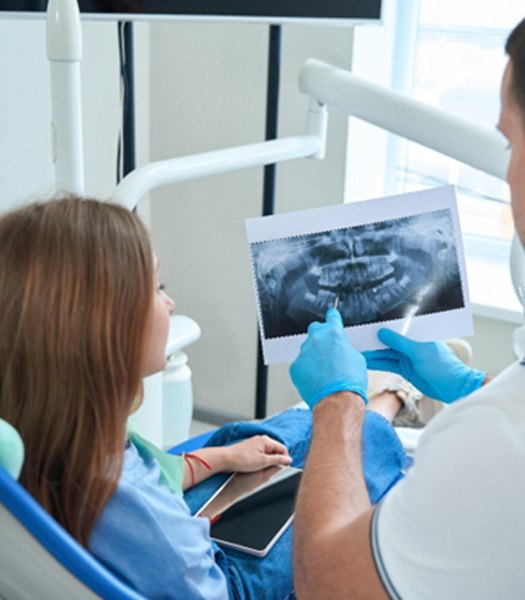 Dentist discussing dental crowns in Los Angeles 