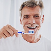 Man brushing teeth