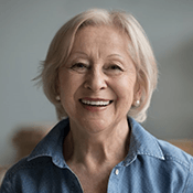 a woman in Los Angeles smiling with dentures