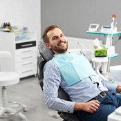 Dental patient with dental implants in Los Angeles, CA sitting back in chair