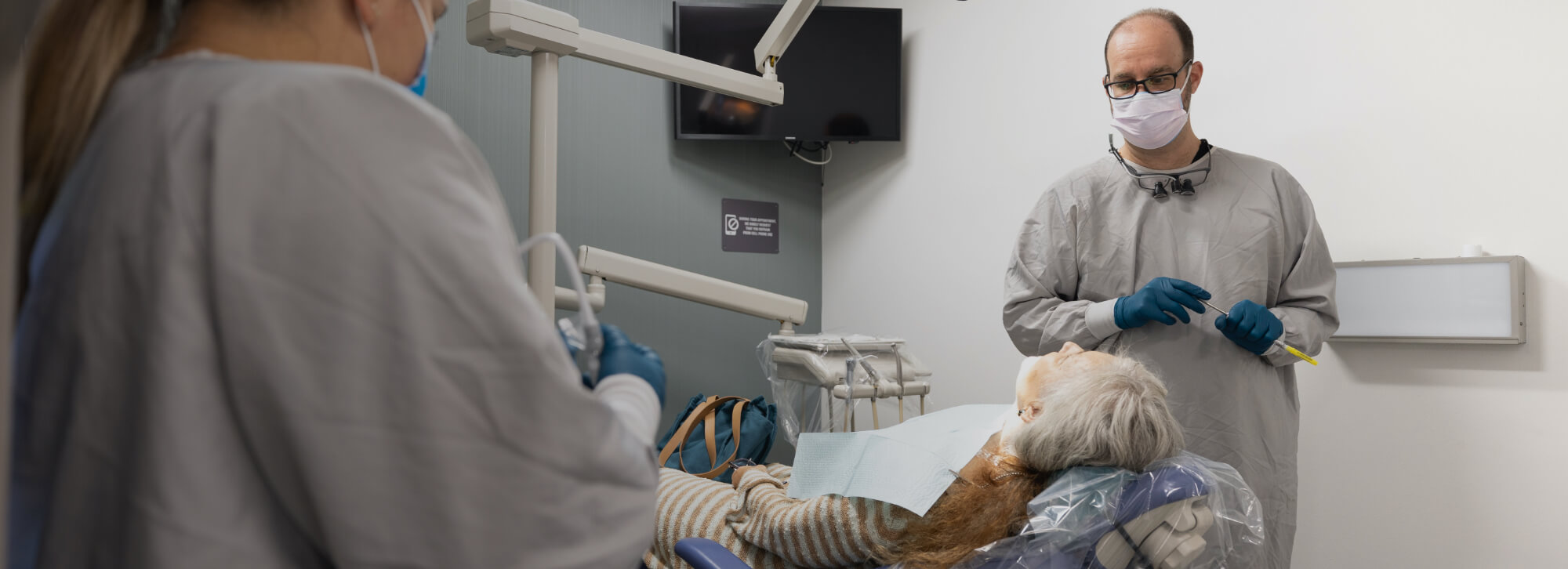 Dental patient talking to dentist