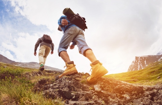 Two people hiking together