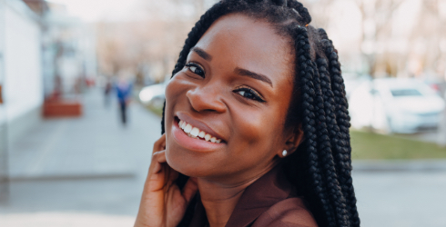 Woman with flawless smile after cosmetic dentistry