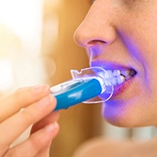 a person undergoing at-home teeth whitening