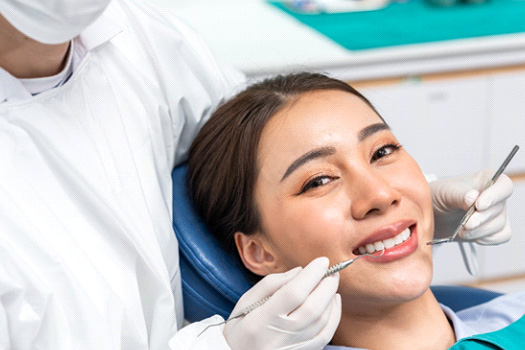 Man smiling at the dentist
