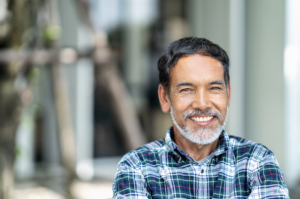 man looks youthful with dental implants  