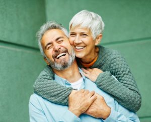 smiling couple hugging